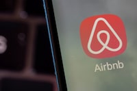 FILE PHOTO: Airbnb app is seen on a smartphone in this illustration taken, February 27, 2022. REUTERS/Dado Ruvic/Illustration/File Photo